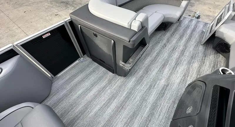 Slide: The Image of 2025 Bennington 22MFB Quad Bench interior with gray seating and flooring. - 8