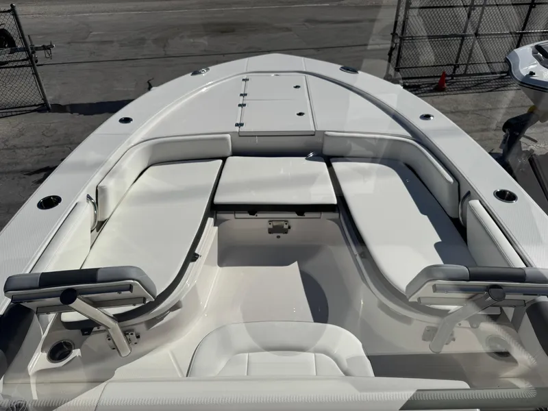 Slide: The Image of 2024 Robalo 246 Cayman boat interior with spacious seating and sleek design. - 34