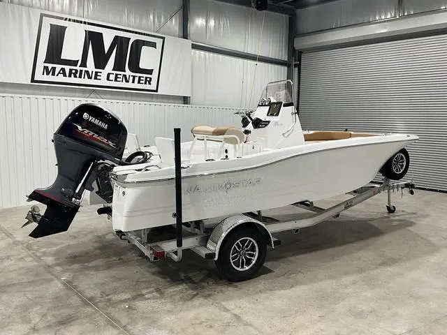 Slide: The Image of 2025 NauticStar 191 Hybrid boat on trailer at LMC Marine Center. - 8