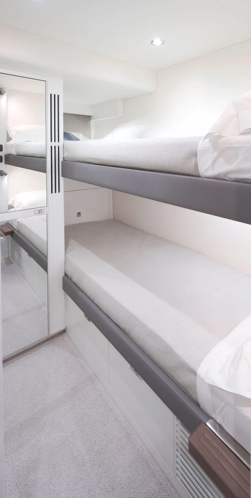 Slide: The Image of Interior of 2025 Princess Y95 Motor Yacht with modern bunk beds. - 20
