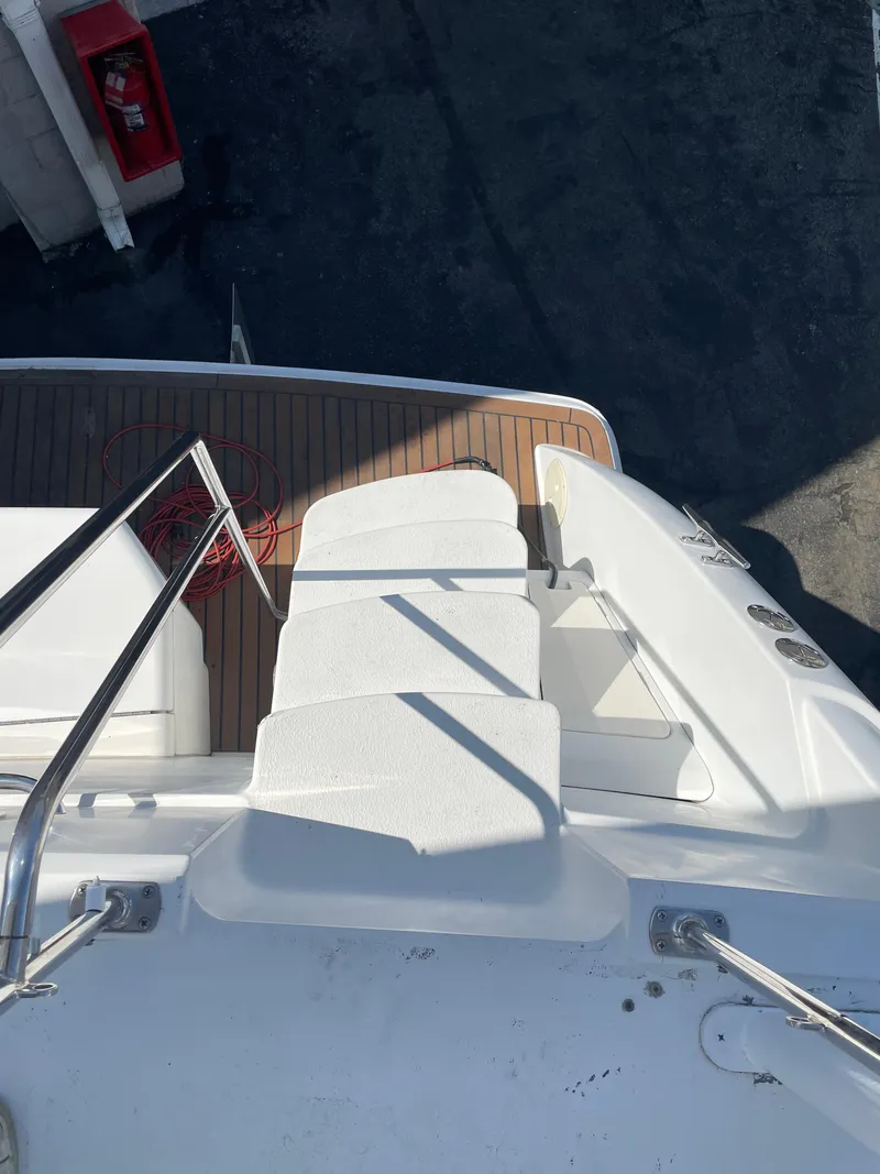 Slide: The Image of Stairs on a 1997 Carver 405 yacht with wooden deck and railing. - 39