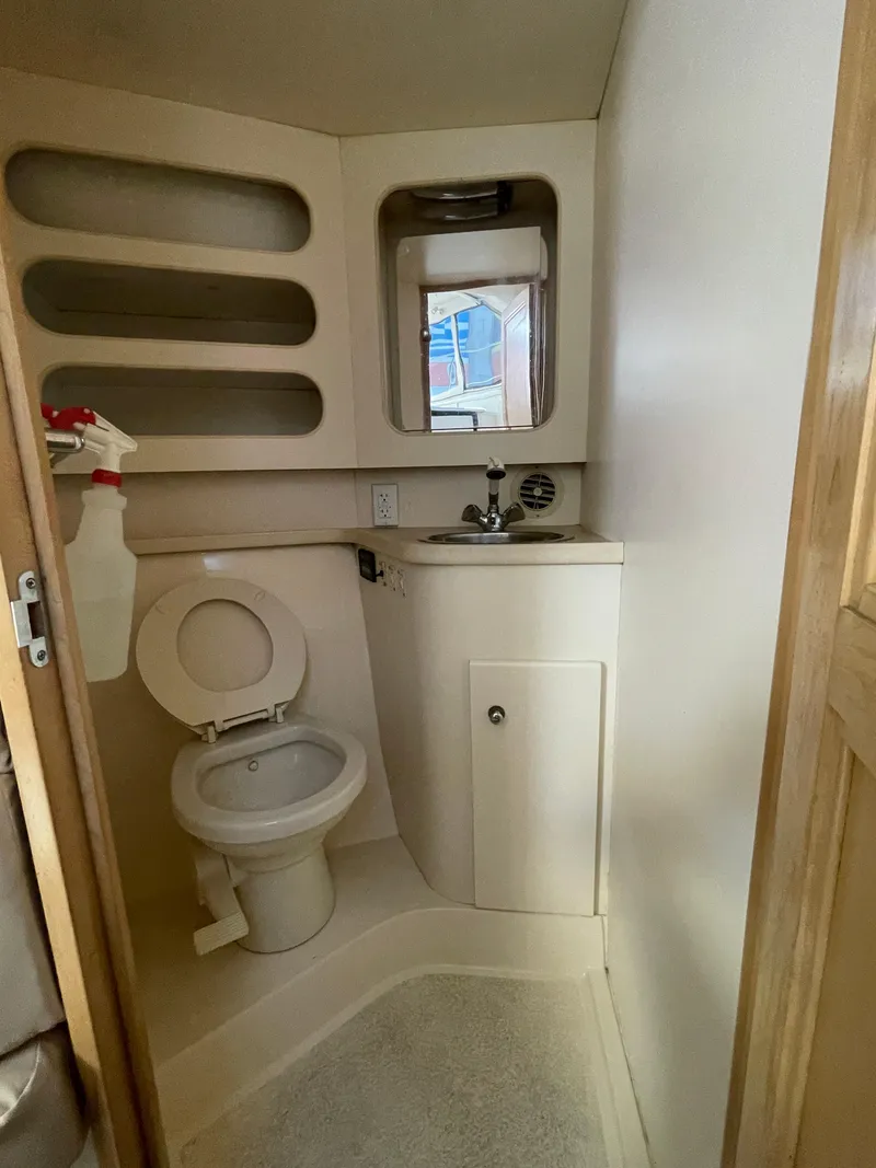 Slide: The Image of Interior of 1997 Carver 405 yacht showing cabin entrance and seating area. - 15