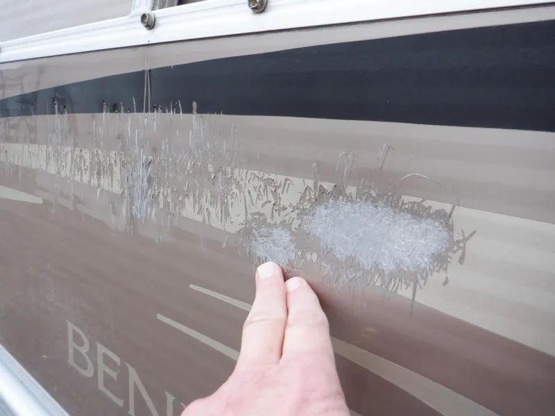 Slide: The Image of Close-up of scratched paint on 2011 Bennington 22 SSL boat. - 15