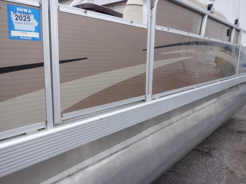 Slide: The Image of 2011 Bennington 22 SSL pontoon boat with Iowa registration sticker. - 16