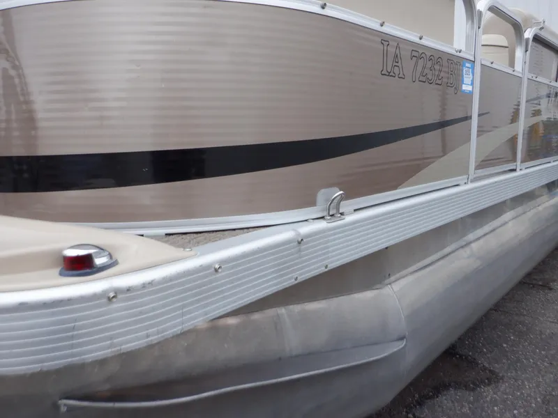 Slide: The Image of 2011 Bennington 22 SSL pontoon boat side view with registration number. - 17