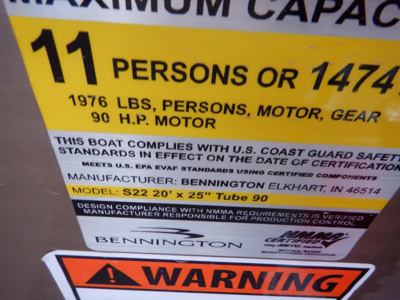Slide: The Image of Capacity label for 2011 Bennington 22 SSL boat, 11 persons or 1474 lbs, 90 HP motor. - 36