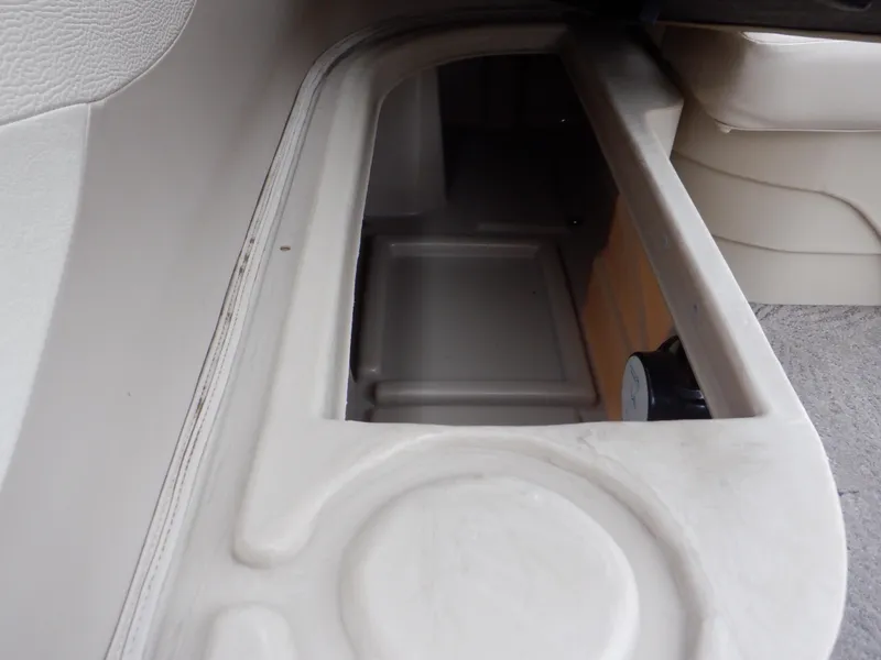 Slide: The Image of Storage compartment in a 2011 Bennington 22 SSL boat interior. - 42