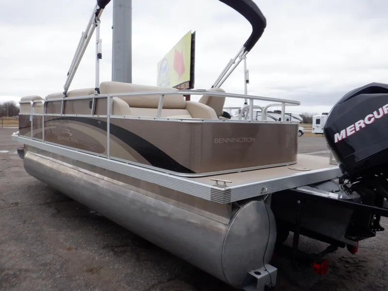 Slide: The Image of 2011 Bennington 22 SSL pontoon boat with Mercury outboard motor. - 6