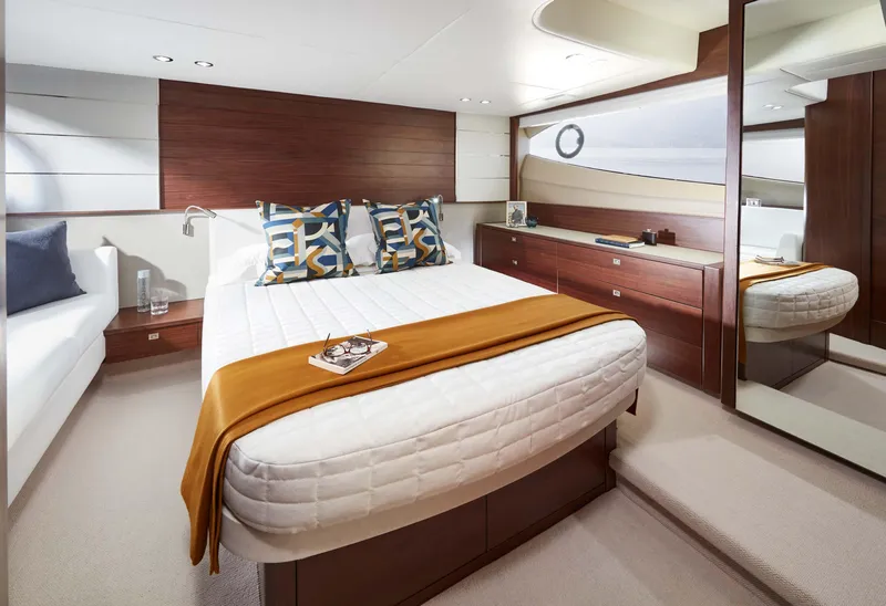 Slide: The Image of Luxurious cabin interior of 2025 Princess V50 Open yacht with modern decor. - 12