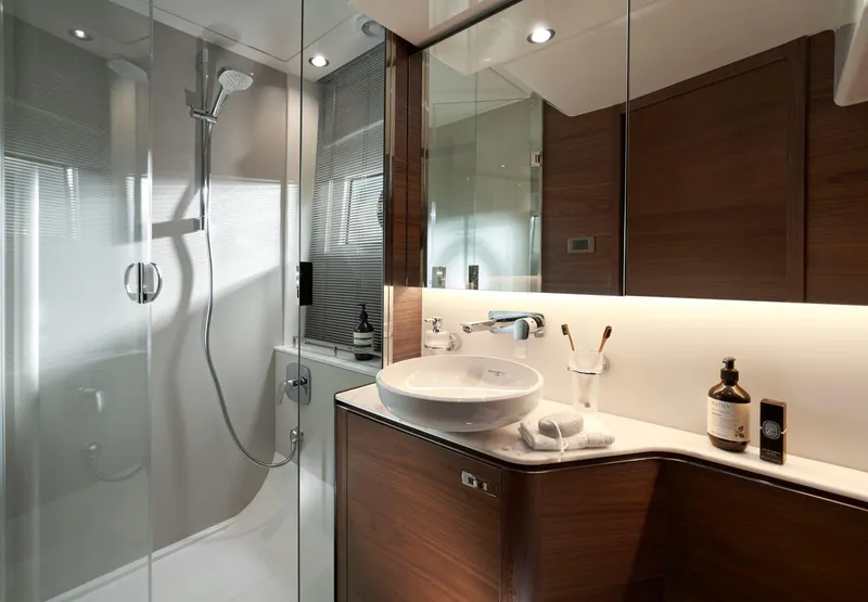 Slide: The Image of Luxurious bathroom in 2025 Princess V50 Open yacht with modern fixtures and elegant design. - 25