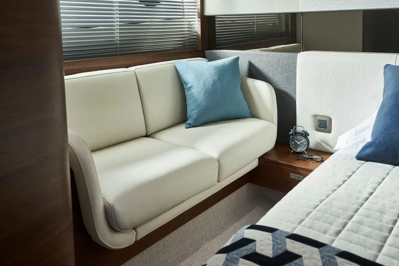 Slide: The Image of Luxurious interior of 2025 Princess V50 Open yacht with elegant sofa and decor. - 26