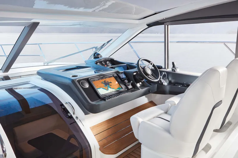 Slide: The Image of Luxurious 2025 Princess V50 Open yacht cockpit with modern navigation system and sleek design. - 6
