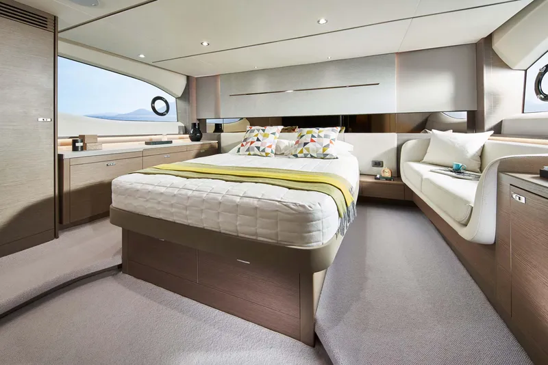 Slide: The Image of Luxurious interior of 2025 Princess V55 Express yacht with modern bedroom design. - 14