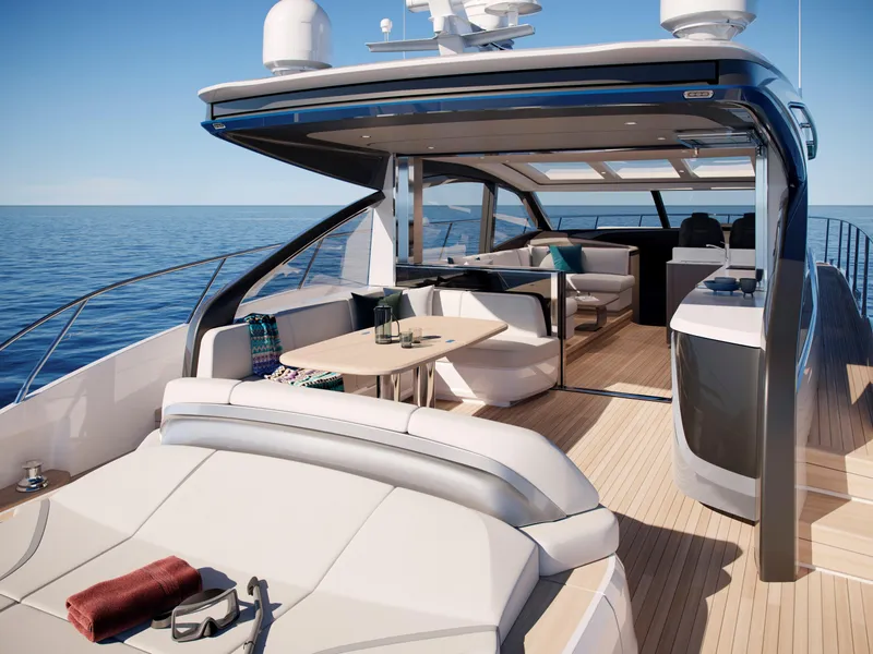 Slide: The Image of Luxurious 2025 Princess V55 Express yacht interior with elegant seating and ocean view. - 7