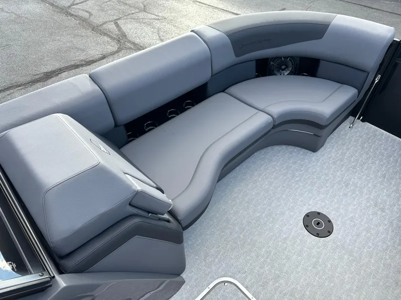 Slide: The Image of 2025 South Bay 525 ULDC boat interior with sleek gray seating. - 17