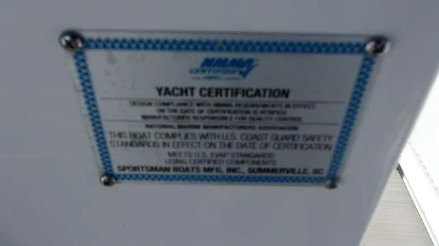 Slide: The Image of Yacht certification plaque for 2025 Sportsman Heritage 261 boat. - 19