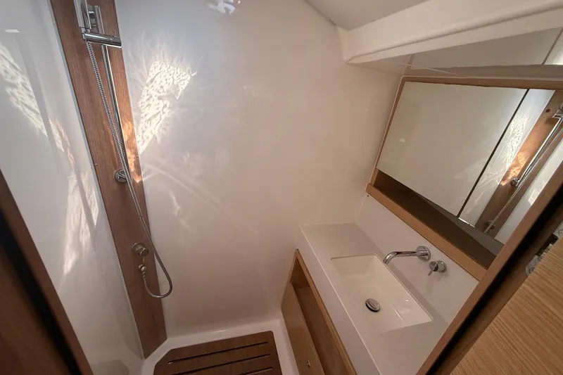 Slide: The Image of Modern bathroom interior of 2022 Dufour 530 yacht with shower and sink. - 24