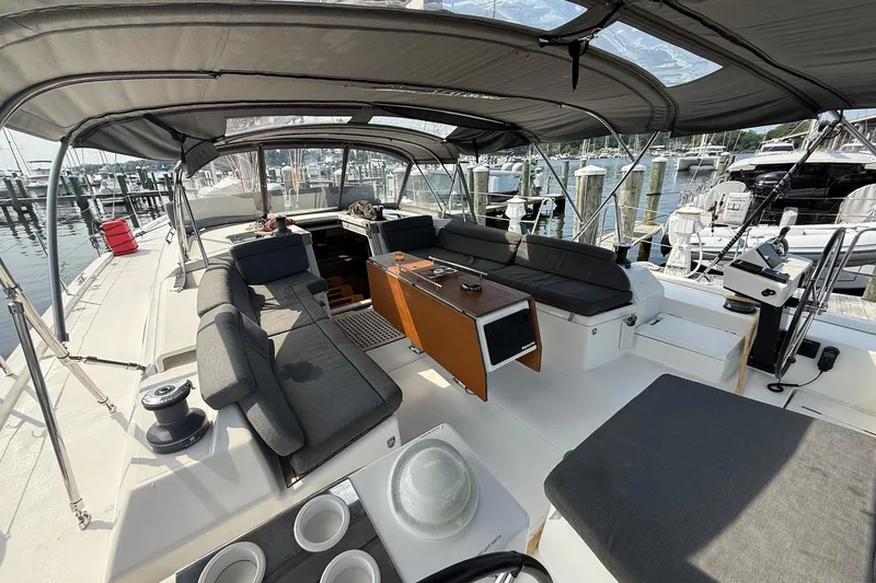 Slide: The Image of Spacious 2022 Dufour 530 yacht cockpit with comfortable seating and modern design. - 36