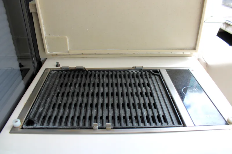 Slide: The Image of Outdoor grill on 2018 Regal 42 Fly yacht deck. - 18