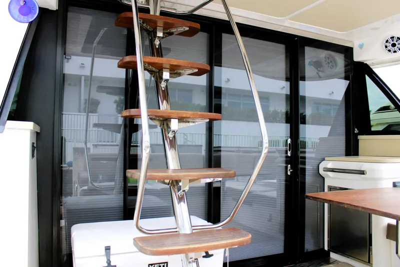Slide: The Image of Staircase on 2018 Regal 42 Fly yacht with modern interior design. - 19