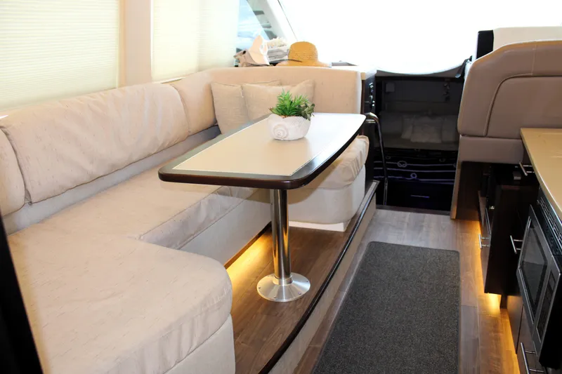 Slide: The Image of Luxurious interior of 2018 Regal 42 Fly yacht with elegant seating and table. - 22
