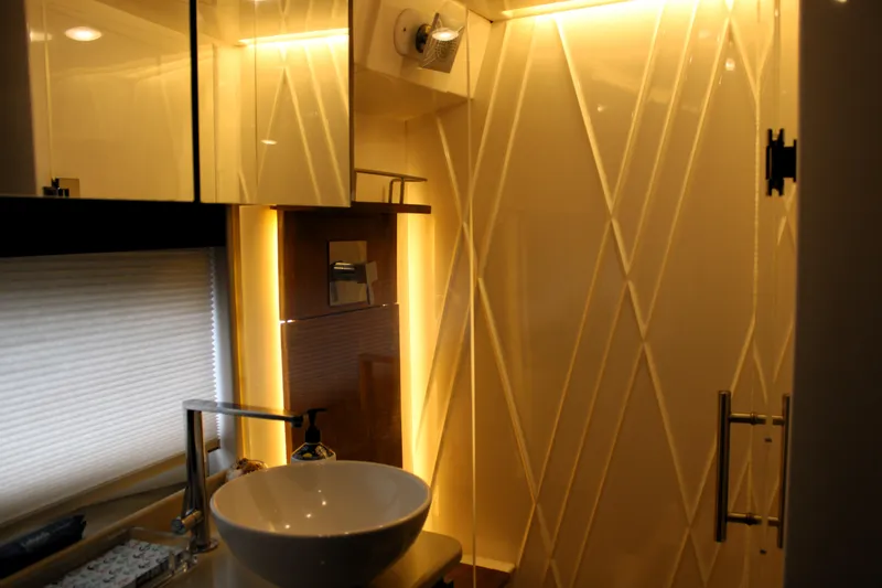Slide: The Image of Luxurious bathroom interior of 2018 Regal 42 Fly yacht with modern lighting and fixtures. - 26