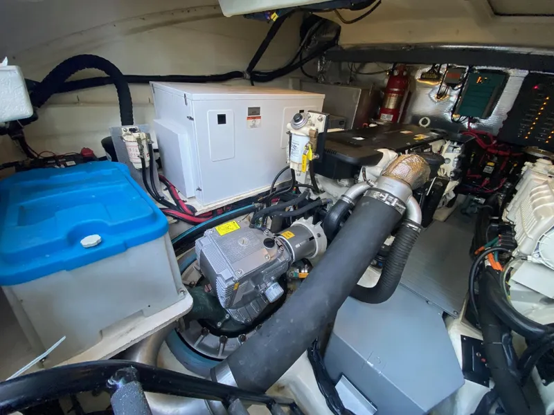 Slide: The Image of Engine room of 2018 Regal 42 Fly yacht with visible machinery and equipment. - 29