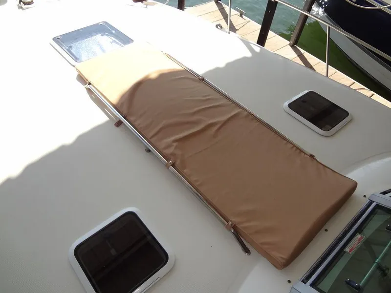 Slide: The Image of 2000 Sea Ray 340 Sundancer deck with sunpad and hatches. - 10