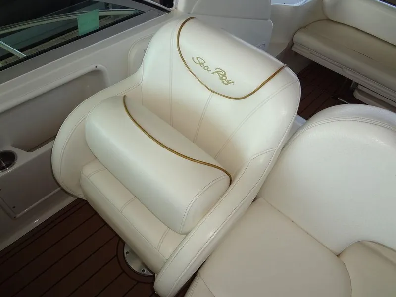 Slide: The Image of Luxurious white leather seat on 2000 Sea Ray 340 Sundancer boat. - 23