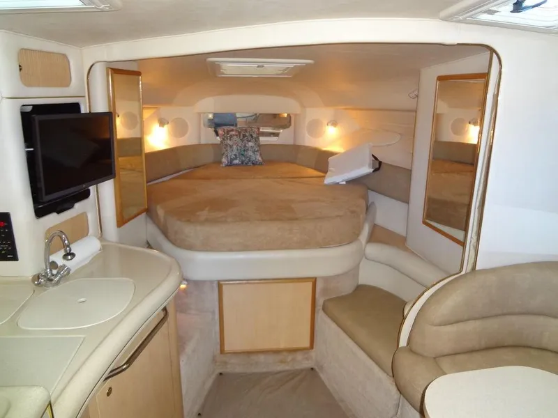 Slide: The Image of Interior of 2000 Sea Ray 340 Sundancer yacht with cozy cabin and modern amenities. - 27