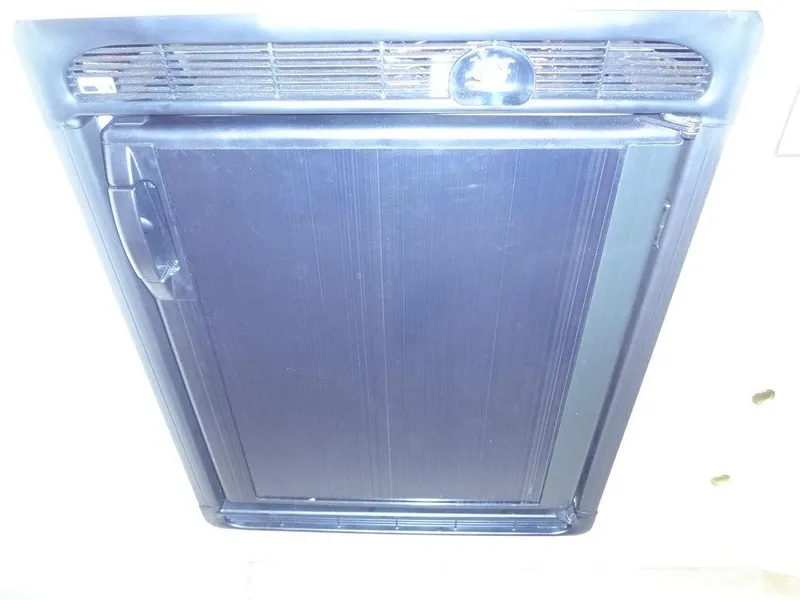 Slide: The Image of Black refrigerator door on 2000 Sea Ray 340 Sundancer boat. - 36