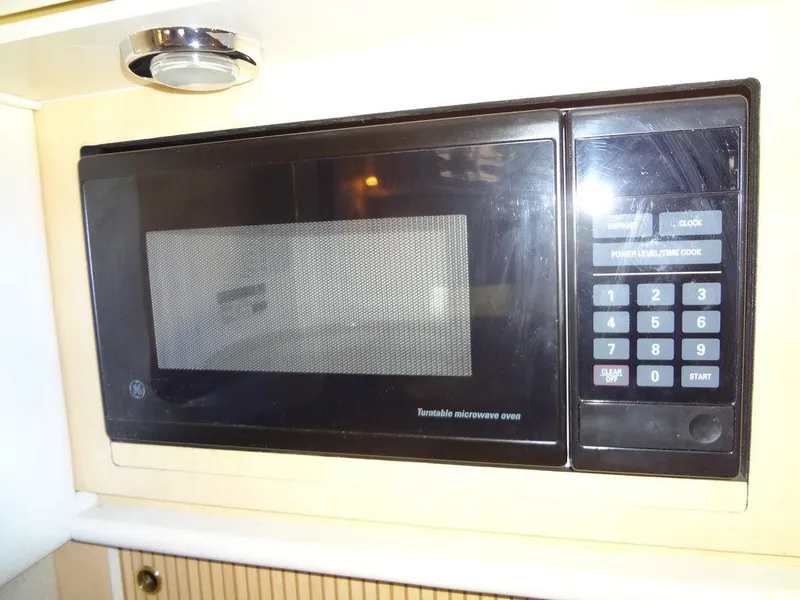 Slide: The Image of Microwave oven in 2000 Sea Ray 340 Sundancer yacht kitchen. - 37
