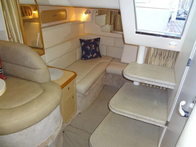 Slide: The Image of Interior of 2000 Sea Ray 340 Sundancer yacht with cozy seating and elegant design. - 39
