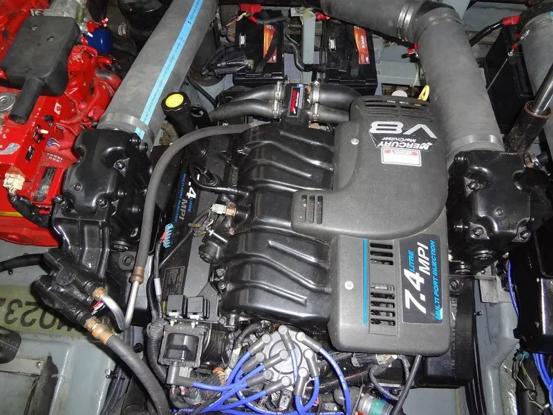 Slide: The Image of Engine of 2000 Sea Ray 340 Sundancer, featuring a 7.4 MPI V8 motor. - 46