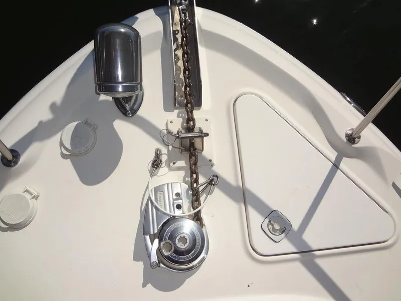 Slide: The Image of Sea Ray 340 Sundancer 2000 boat deck with anchor chain and winch. - 9