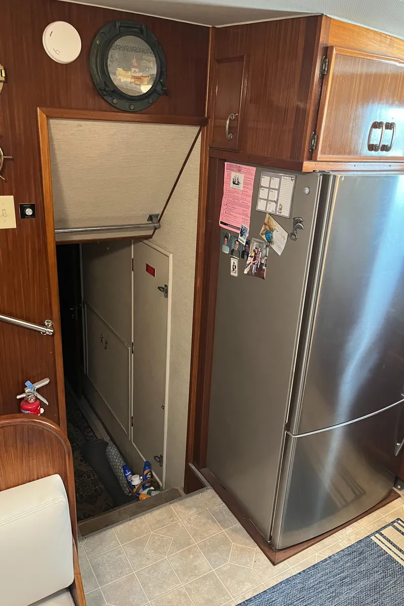 Slide: The Image of Interior of 1979 Hatteras 53 Motor Yacht with stainless steel refrigerator. - 3