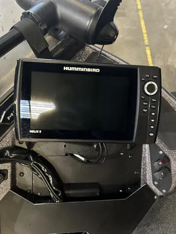 Slide: The Image of Humminbird Helix 9 fishfinder on 2024 Skeeter ZXR 21 boat dashboard. - 9
