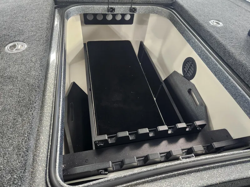 Slide: The Image of 2025 Ranger Z520R Garmin Ranger Cup Equipped boat storage compartment. - 10