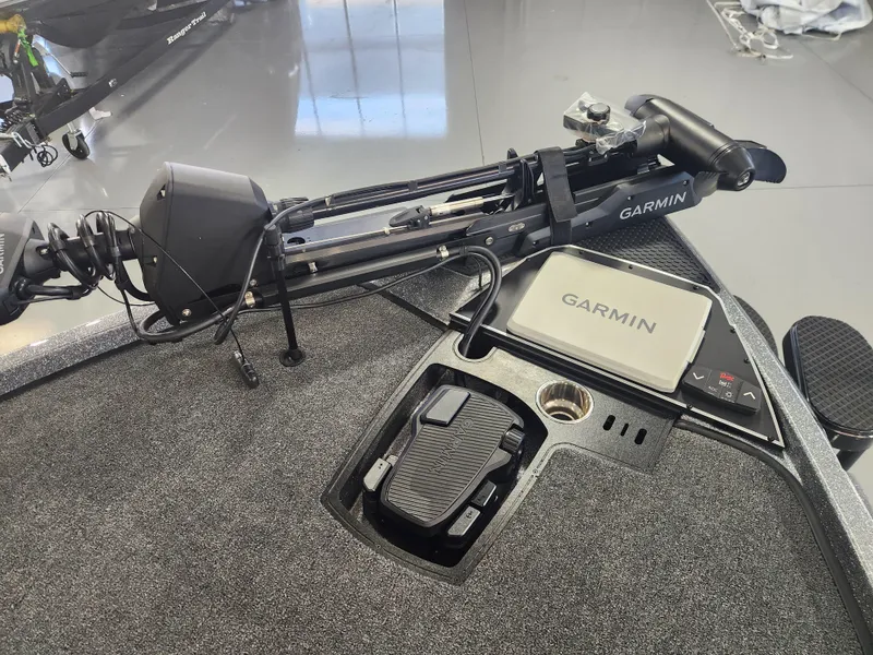 Slide: The Image of 2025 Ranger Z520R boat with Garmin equipment, featuring advanced navigation technology. - 13