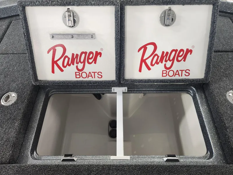 Slide: The Image of 2025 Ranger Z520R Garmin storage compartments with Ranger Boats branding. - 21
