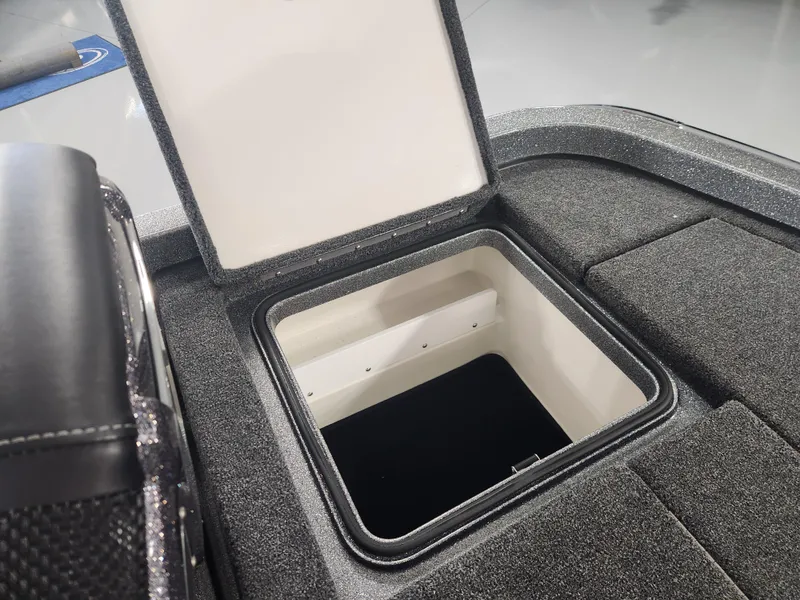 Slide: The Image of 2025 Ranger Z520R Garmin Ranger Cup Equipped boat storage compartment open. - 22