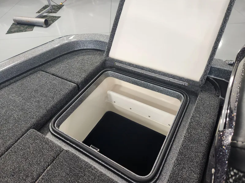 Slide: The Image of Open storage compartment in 2025 Ranger Z520R Garmin Ranger Cup Equipped boat. - 23
