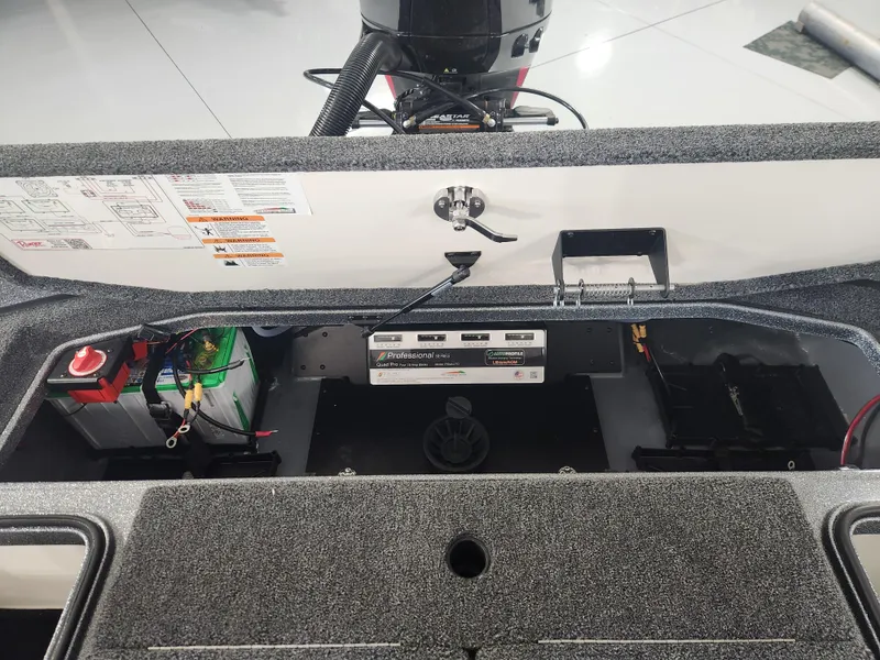 Slide: The Image of 2025 Ranger Z520R Garmin Ranger Cup Equipped boat battery compartment. - 24