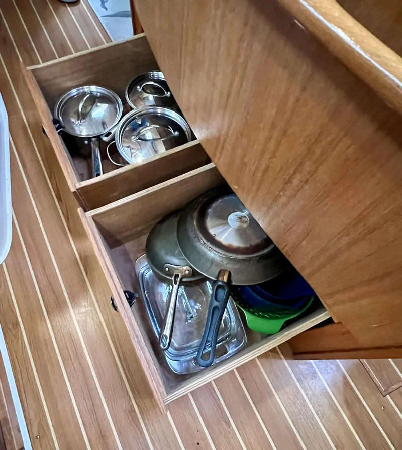 Slide: The Image of Drawers under settee - 11