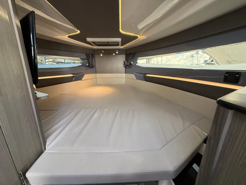 Slide: The Image of Luxurious interior of 2025 Navan C30 yacht with modern lighting and spacious seating. - 19