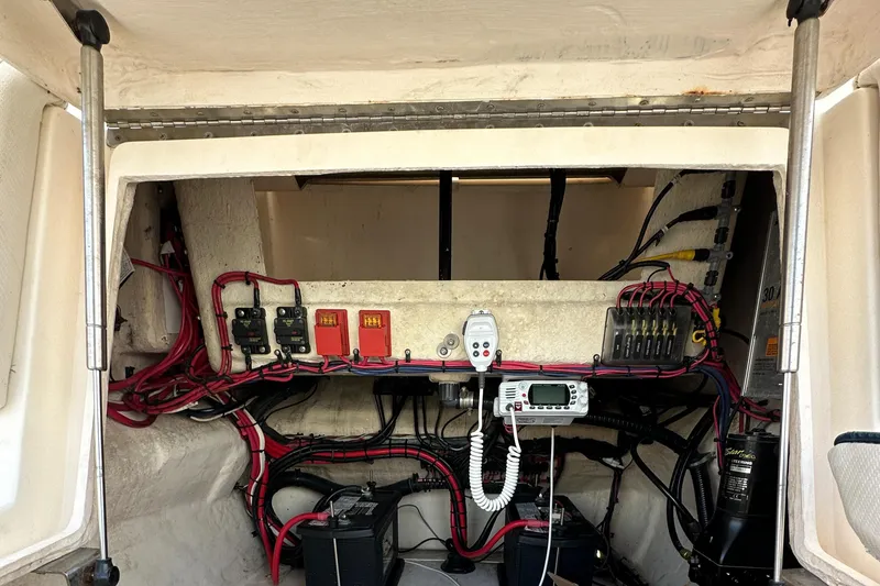 Slide: The Image of 2005 Intrepid 323 boat electrical system with wiring and control panel. - 21