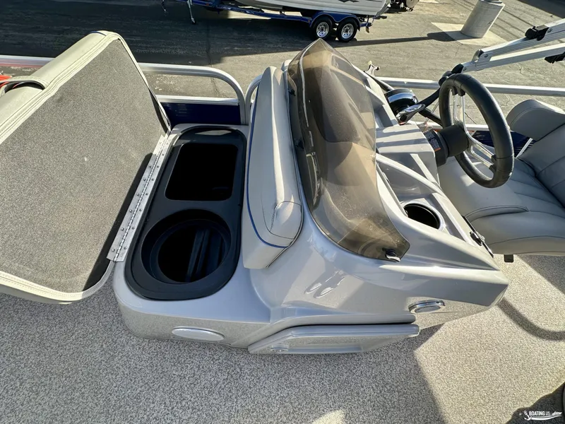 Slide: The Image of 2021 Bennington 20SV boat console with storage and steering wheel. - 10