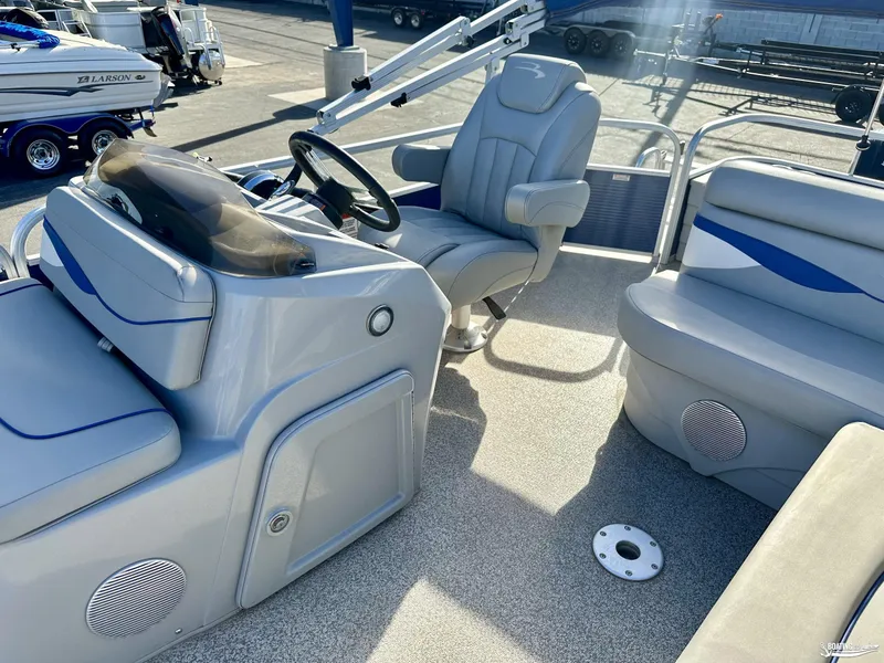 Slide: The Image of 2021 Bennington 20SV boat interior with steering console and seating. - 9