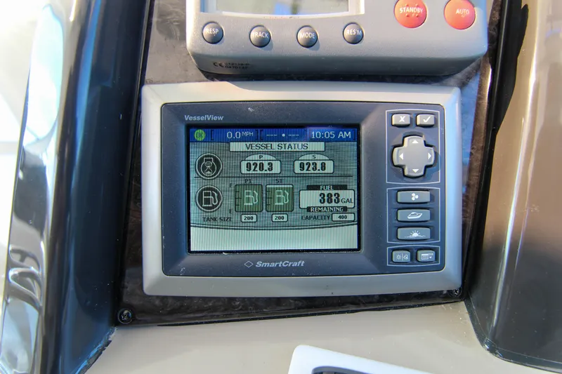 Slide: The Image of SmartCraft VesselView display on 2008 Sea Ray 48 Sundancer dashboard, showing vessel status. - 19