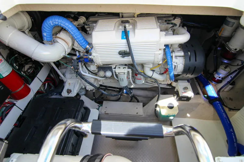 Slide: The Image of Engine room of 2008 Sea Ray 48 Sundancer with visible components and wiring. - 28